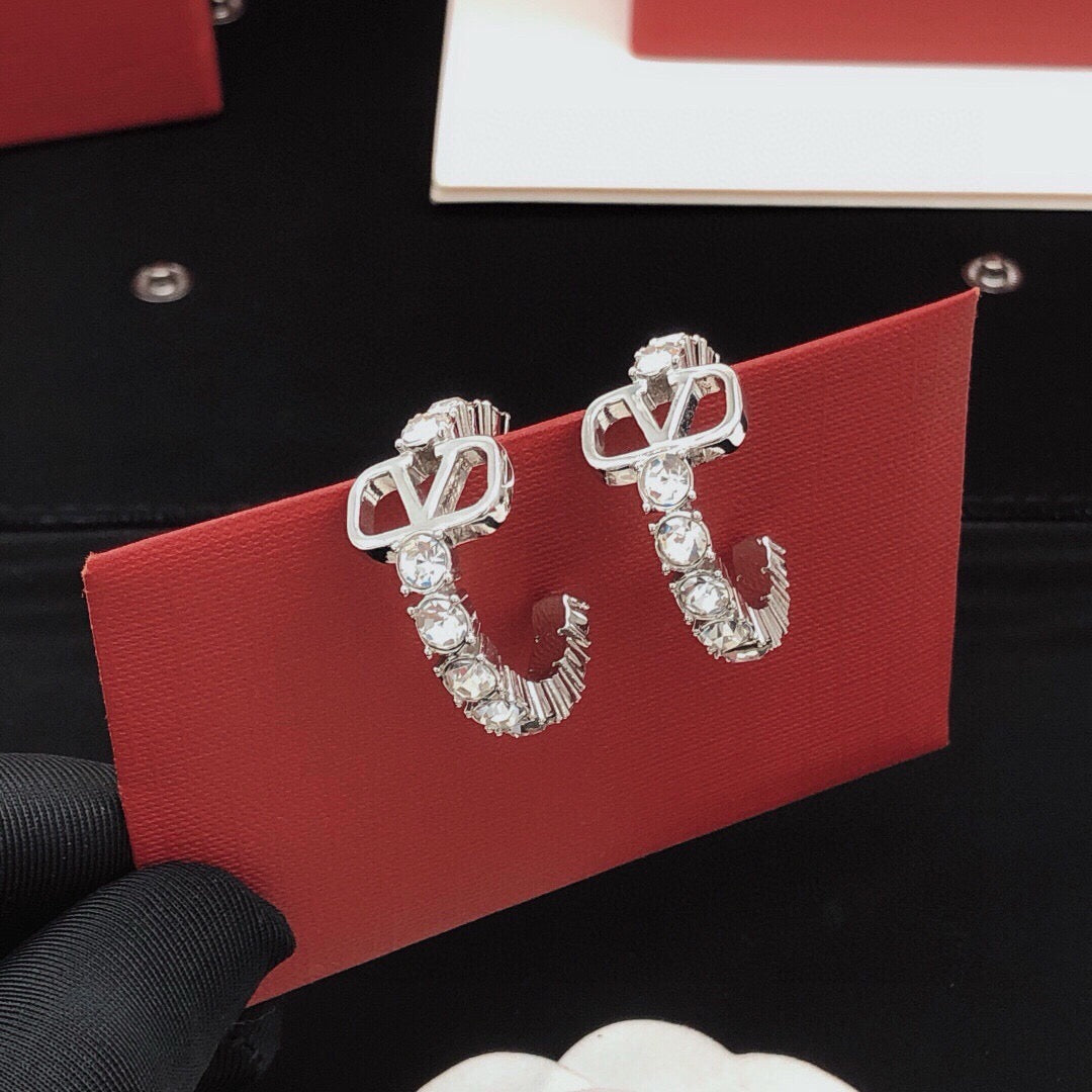 Martin Graham earrings in polished metal-tone – front view