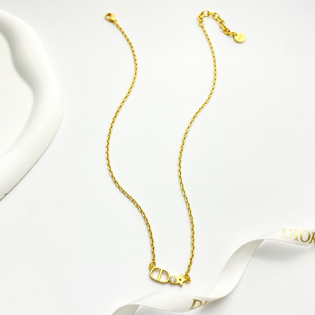 Martin Graham pendant necklace in polished metal-tone – front view