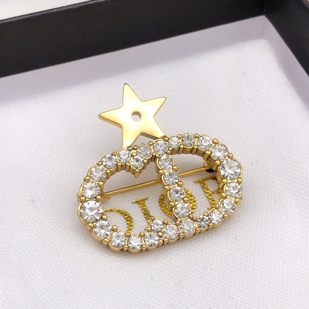 Martin Graham brooch in polished metal-tone – front view
