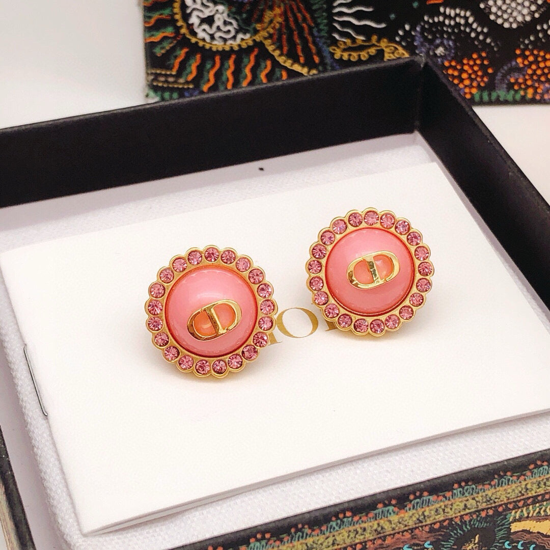 Martin Graham stud earrings in polished metal-tone – front view