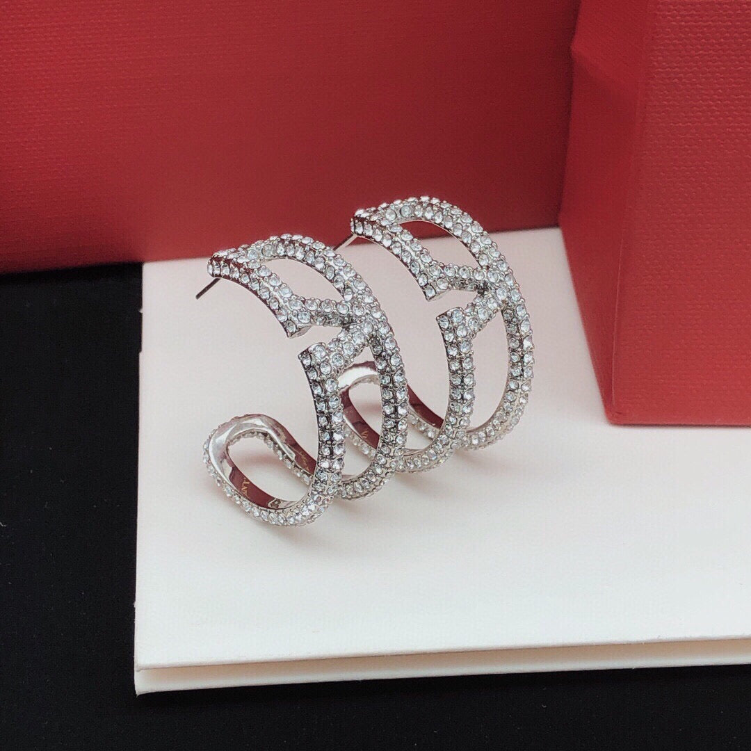 Martin Graham earrings in polished metal-tone – front view