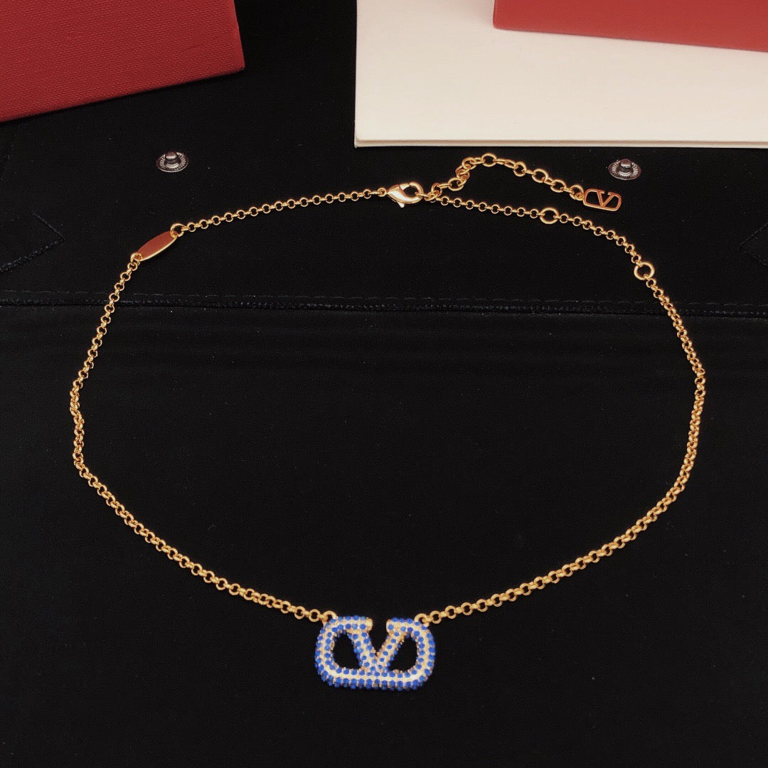 Martin Graham pendant necklace in polished metal-tone – front view
