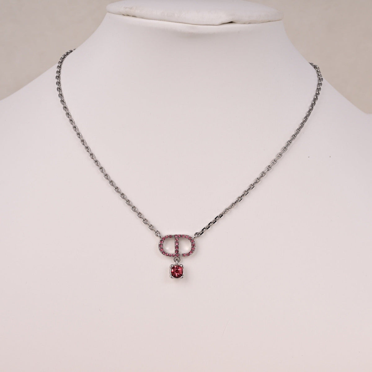 Martin Graham pendant necklace in polished metal-tone – front view