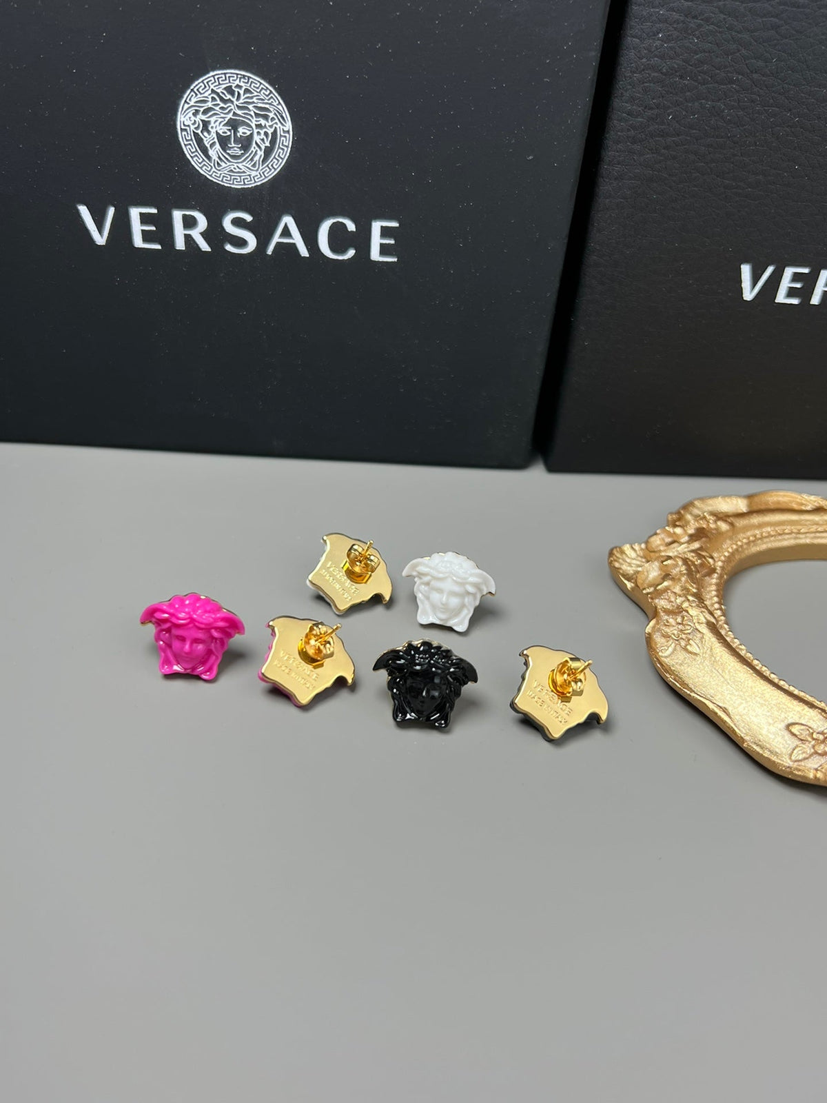 Martin Graham stud earrings in polished metal-tone – front product view