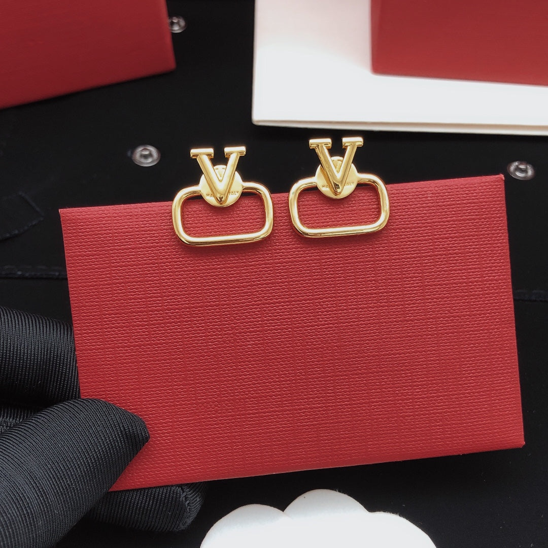 Martin Graham stud earrings in polished metal-tone – front view