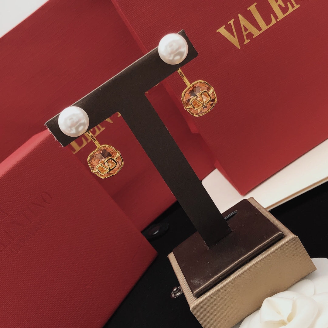 Martin Graham drop earrings in polished metal-tone – front view