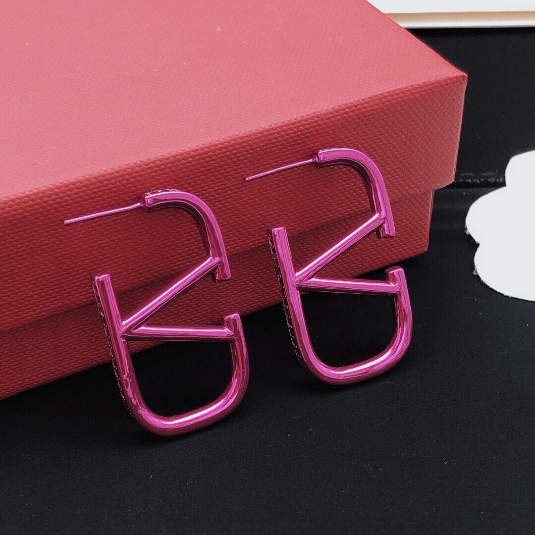 Martin Graham stud earrings in polished metal-tone – front view