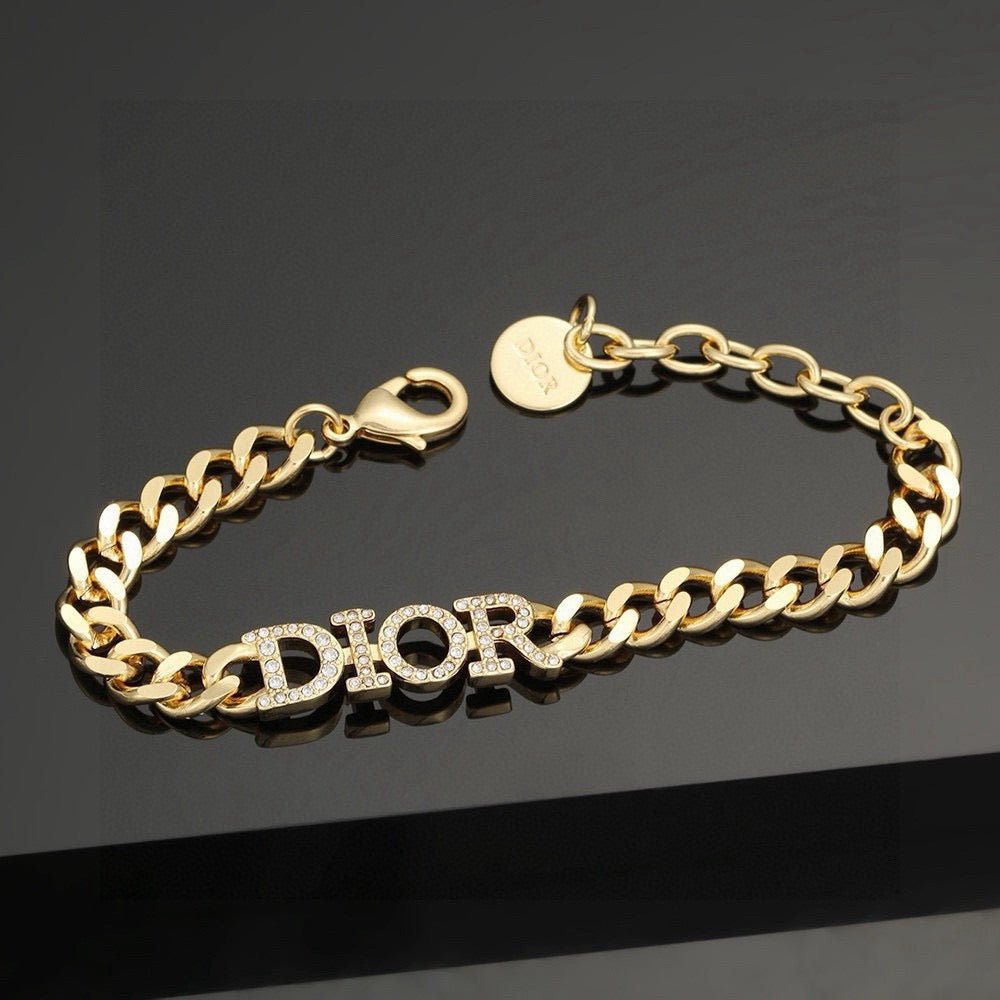Martin Graham pendant necklace in polished metal-tone – front view