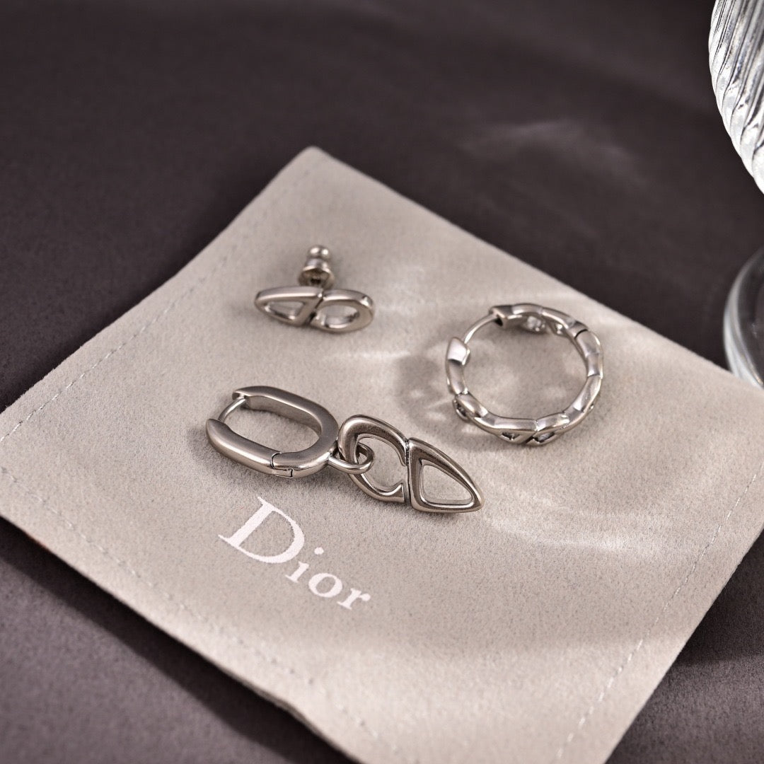 Martin Graham stud earrings in polished metal-tone – front view