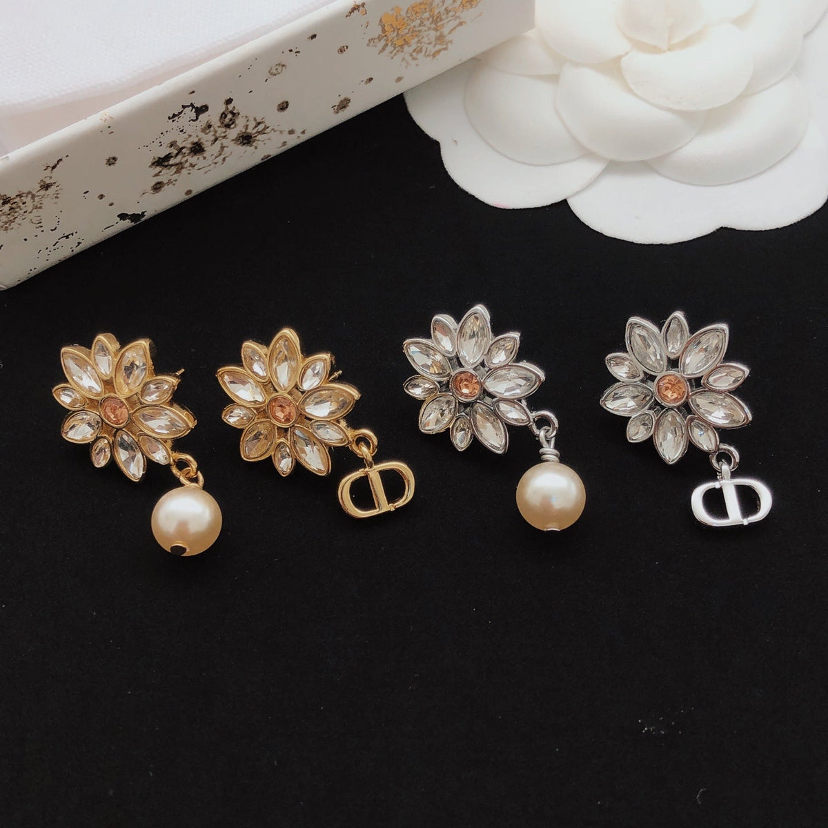 Martin Graham stud earrings in polished metal-tone – front view