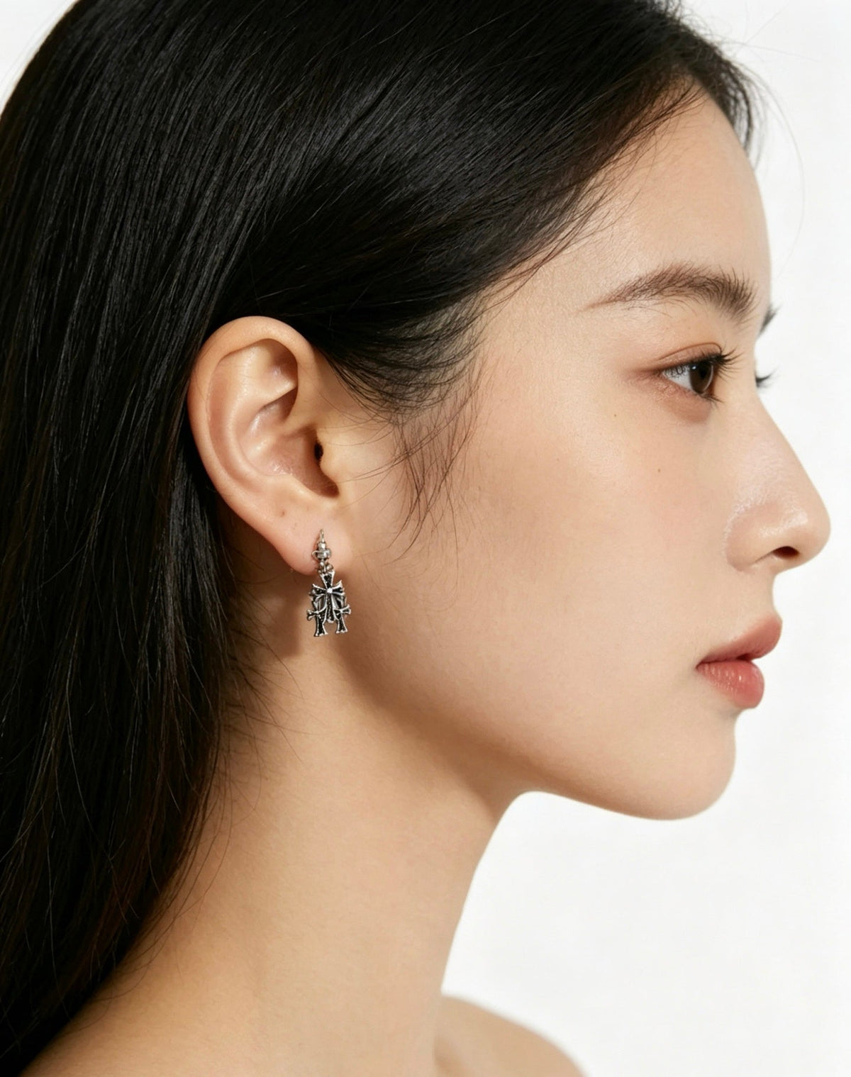 Martin Graham earrings in polished metal-tone – front product view