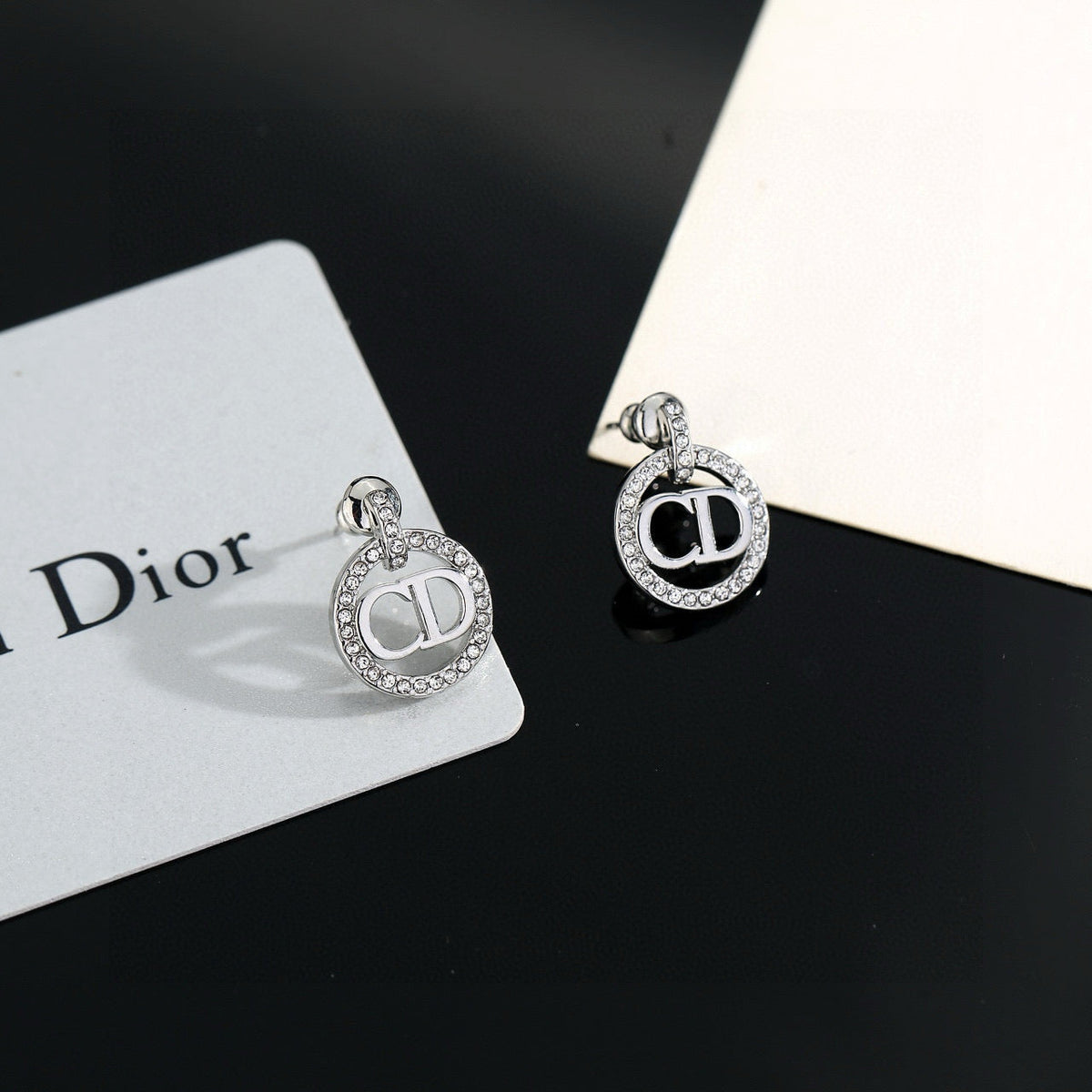 Martin Graham earrings in polished metal-tone – front view
