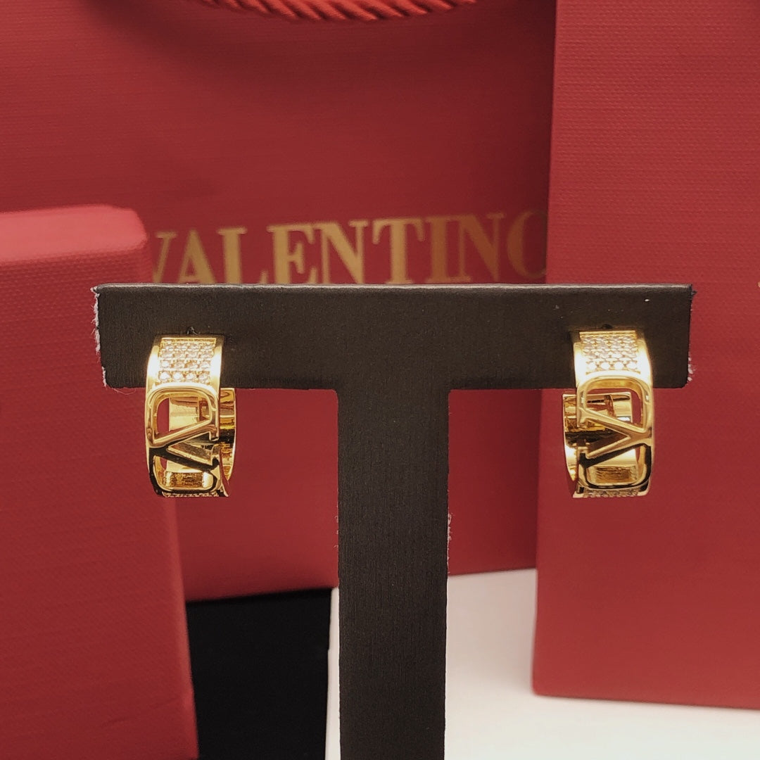 Martin Graham drop earrings in polished metal-tone – detail view
