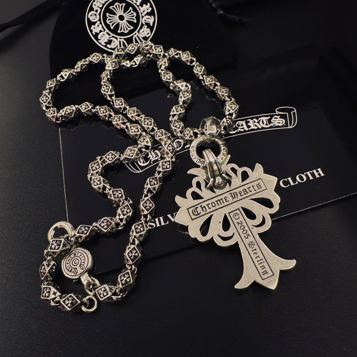Martin Graham pendant necklace in polished metal-tone – detail view