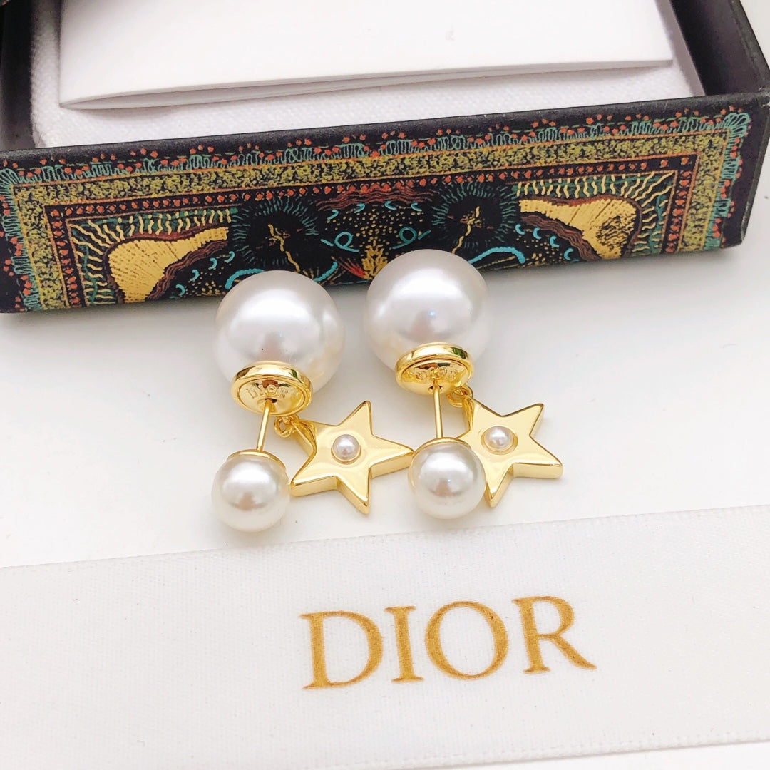 Martin Graham stud earrings in polished metal-tone – detail view