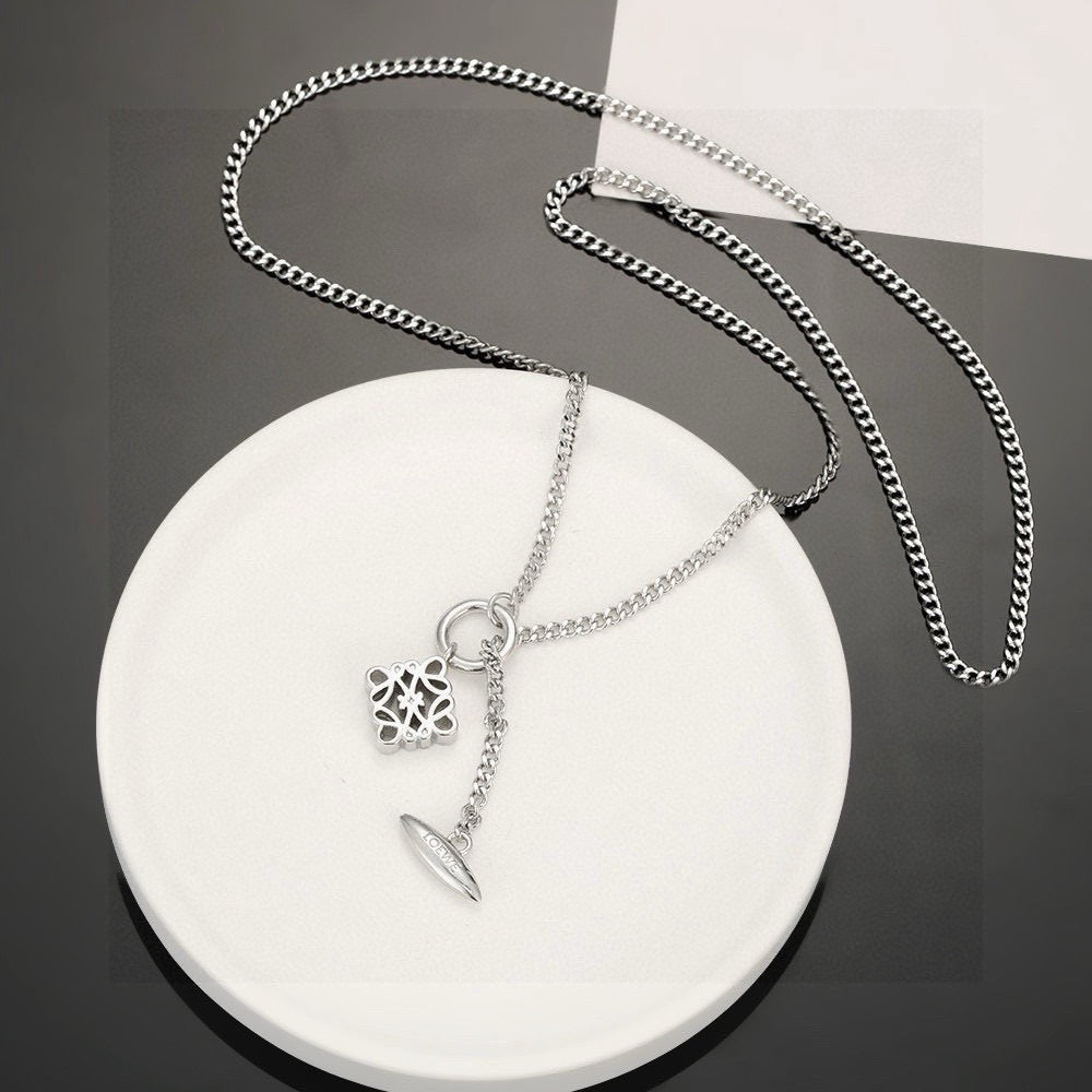 Martin Graham pendant necklace in polished metal-tone – detail view