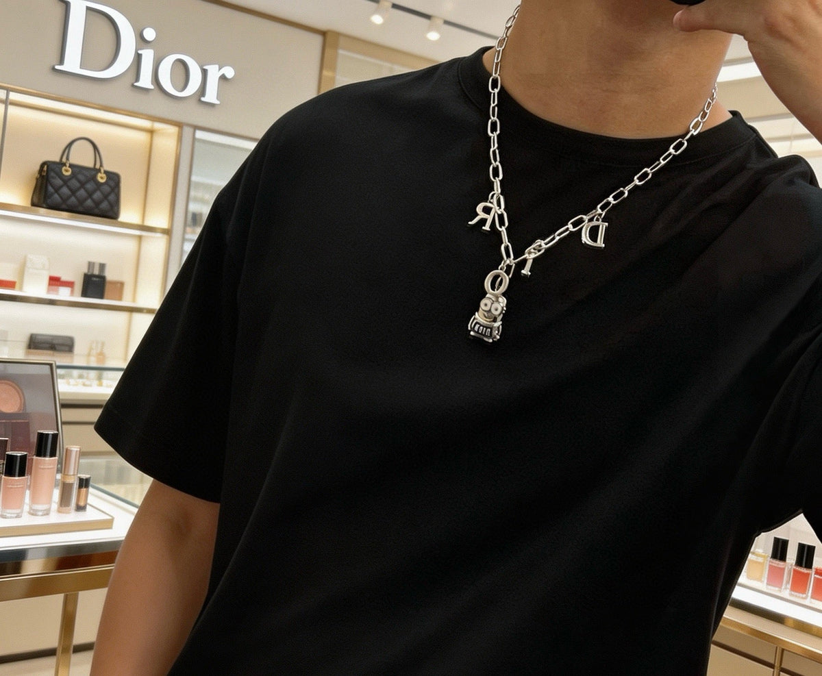 Martin Graham pendant necklace in polished metal-tone – detail view