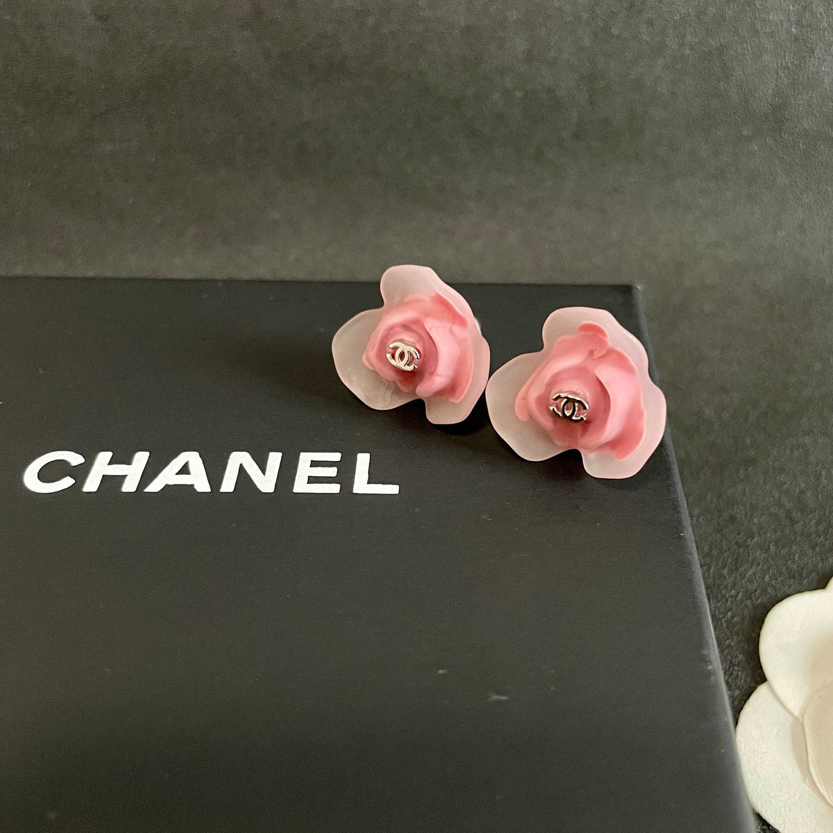 Martin Graham stud earrings in polished metal-tone – detail view