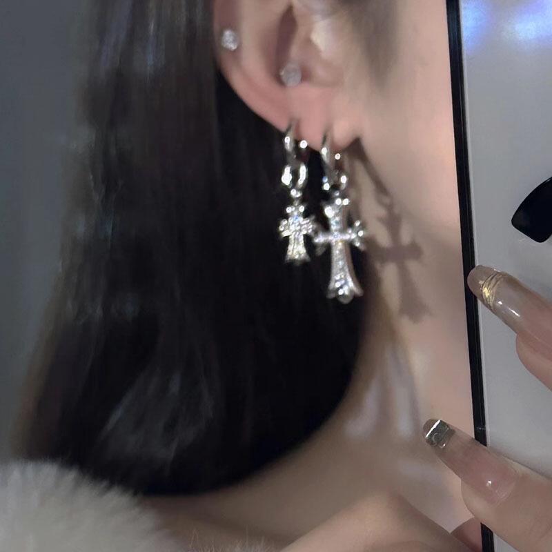 Martin Graham stud earrings in polished metal-tone – detail view