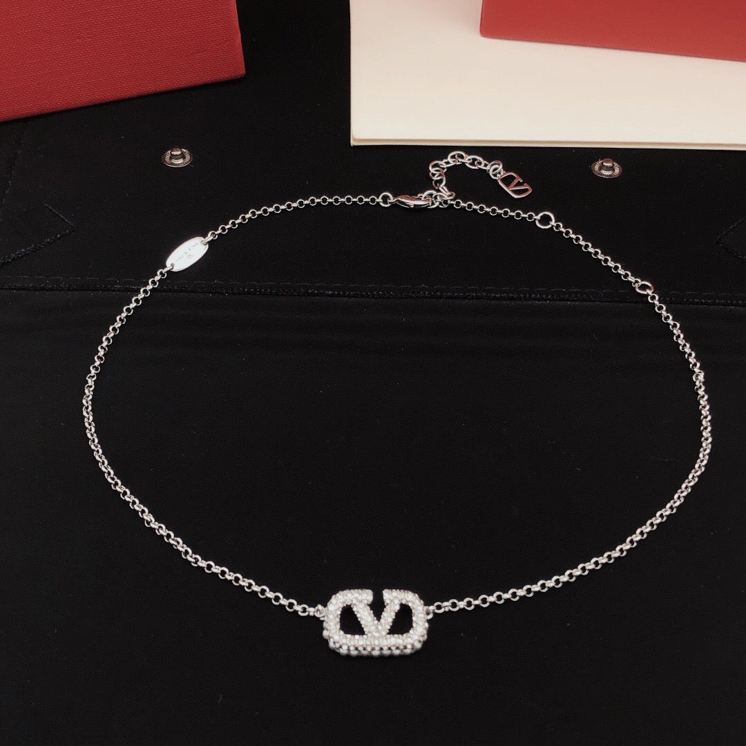 Martin Graham pendant necklace in polished metal-tone – detail view