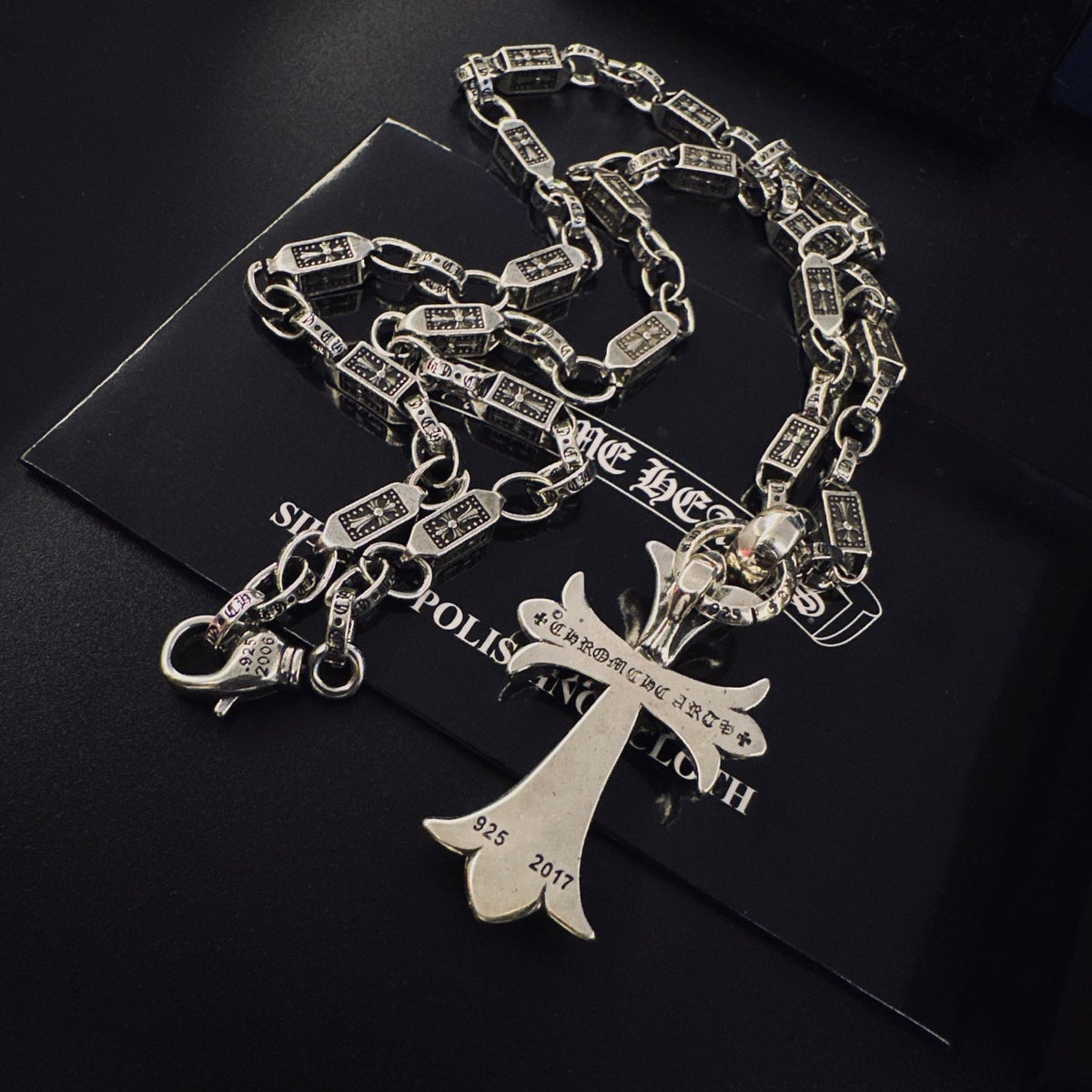 Martin Graham pendant necklace in polished metal-tone – detail view