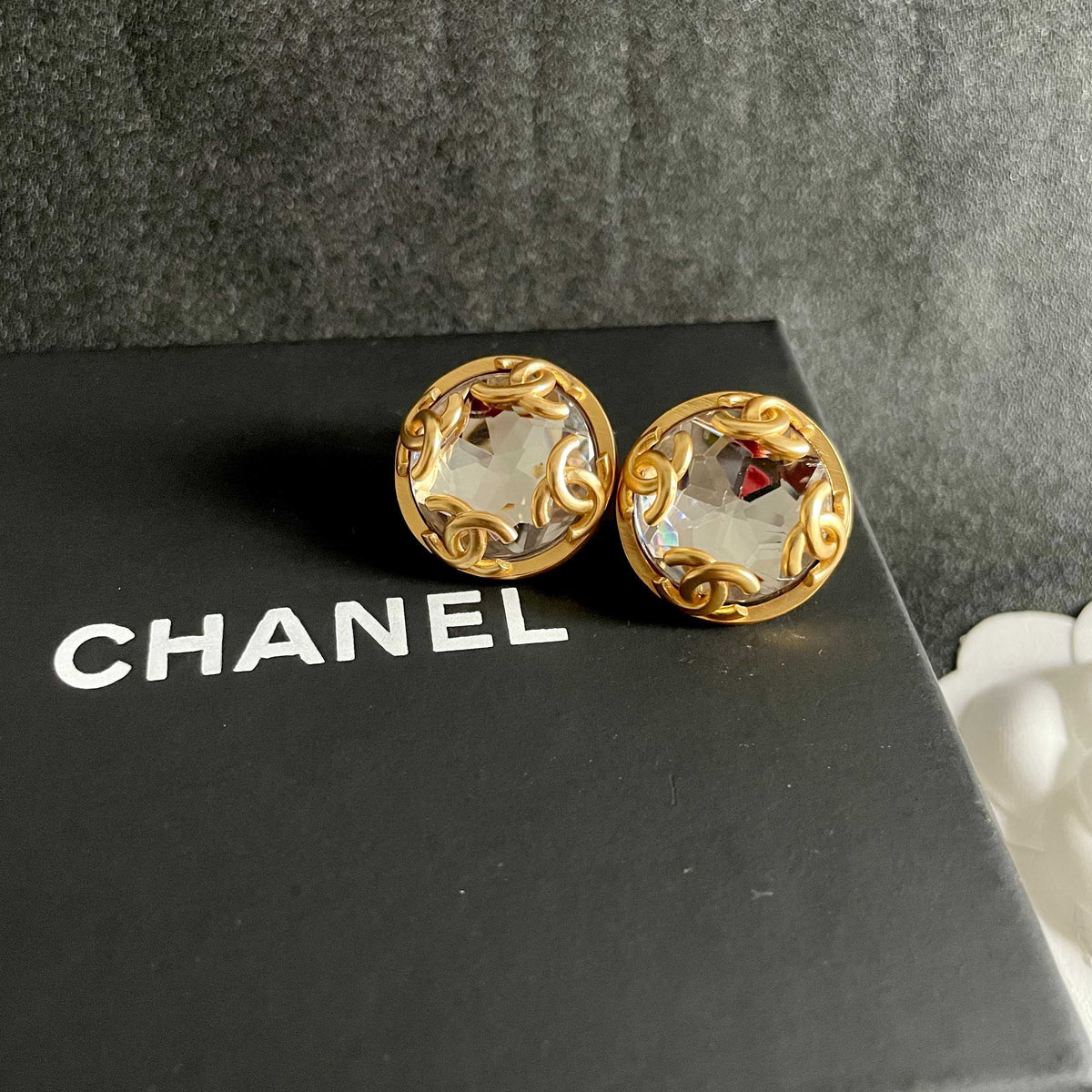 Martin Graham stud earrings in polished metal-tone – detail view