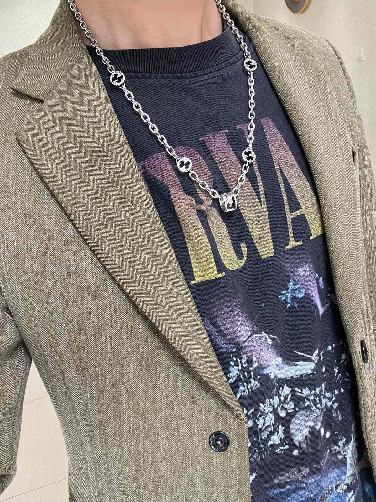 Martin Graham pendant necklace in polished metal-tone – detail view
