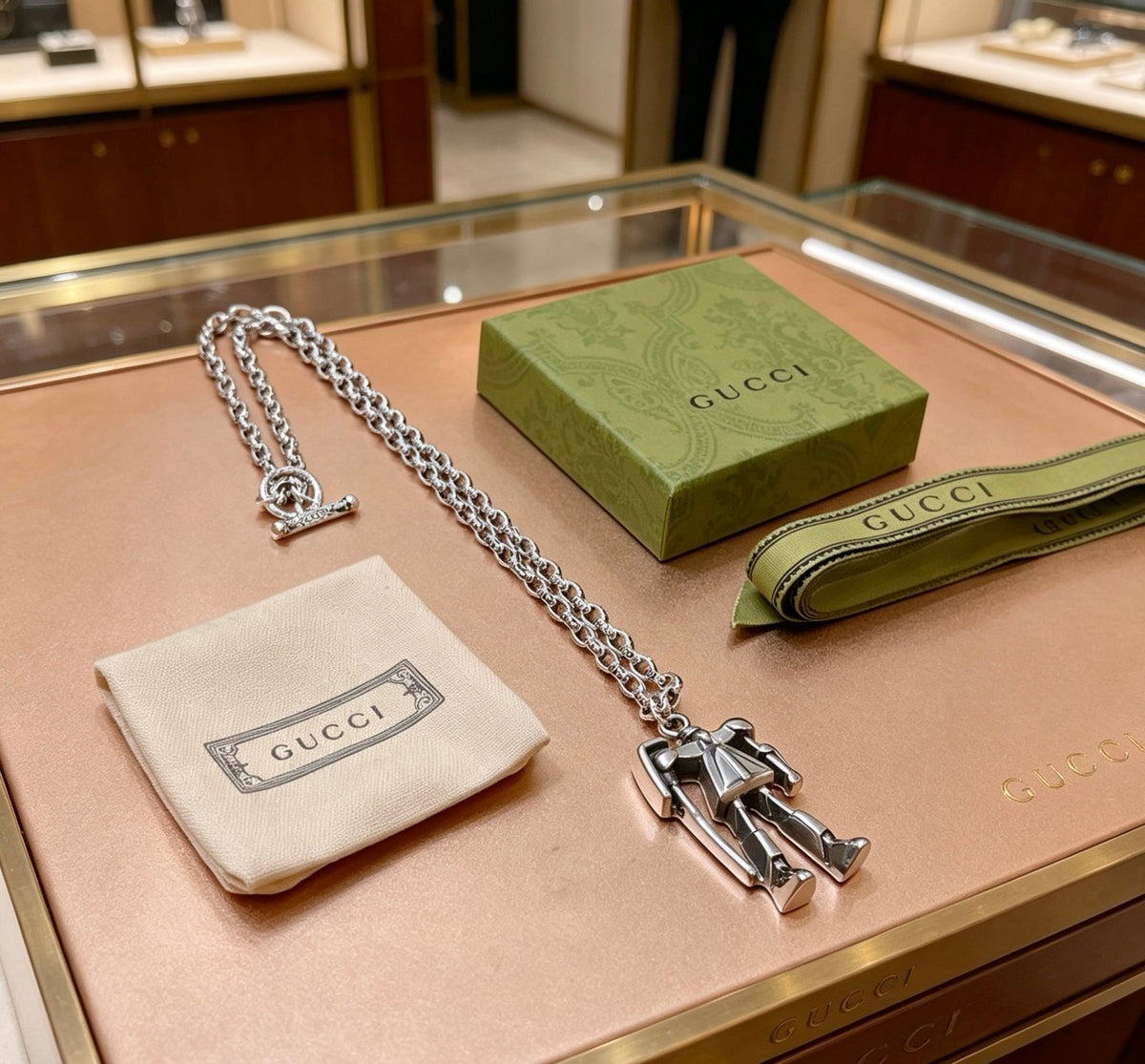 Martin Graham pendant necklace in polished metal-tone – detail view